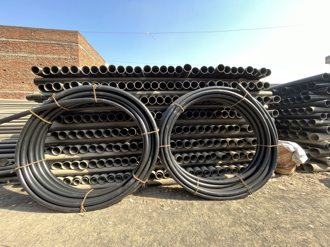 Black pipes stock yard at Shree Keshar Plastic